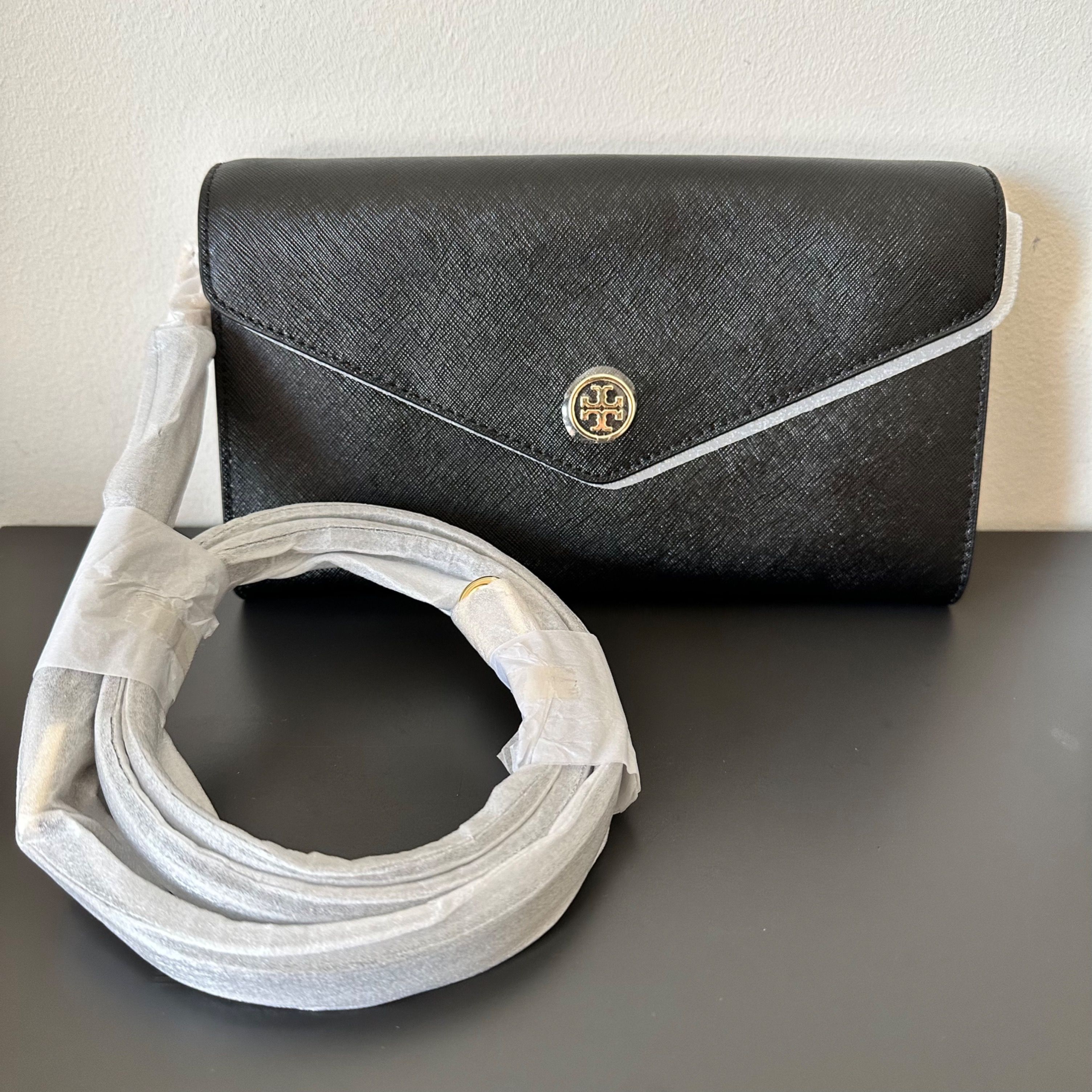 Tory burch robinson clutch sales
