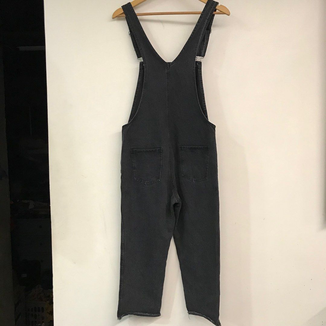 Acid Washed Black Denim Overalls (Category: Jumpsuits) located in Cainta. Submitted by overthemoon. (Listing ID 1248211227, Image 3). Description: Ankle-length overalls in cotton denim. Buttons at sides and adjustable suspenders with metal fasteners. Front bib pocket, side pockets, and back pockets. Tapered legs with tattered hem. (oversized fit for 24-26”) see photos for mannequin’s reference up to 29” waistline Rise 9” Hips 39”.