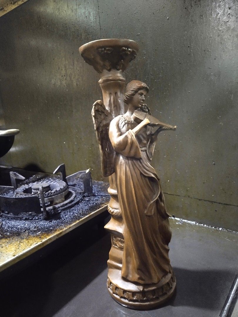 Brass candle holder with angel statue display (Category: Religious Items) located in Manila. Submitted by kurukutuk (Listing ID 1248285371, Image 3). Description: brass candle holder with angel statue display 15 x 5 inches HxL made of brass.