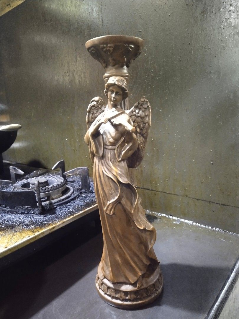 Brass candle holder with angel statue display (Category: Religious Items) located in Manila. Submitted by kurukutuk (Listing ID 1248285371, Image 2). Description: brass candle holder with angel statue display 15 x 5 inches HxL made of brass.