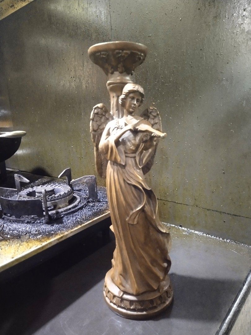 Brass candle holder with angel statue display (Category: Religious Items) located in Manila. Submitted by kurukutuk (Listing ID 1248285371, Image 1). Description: brass candle holder with angel statue display 15 x 5 inches HxL made of brass.