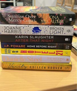 Bundle of 7 fiction novels like new
