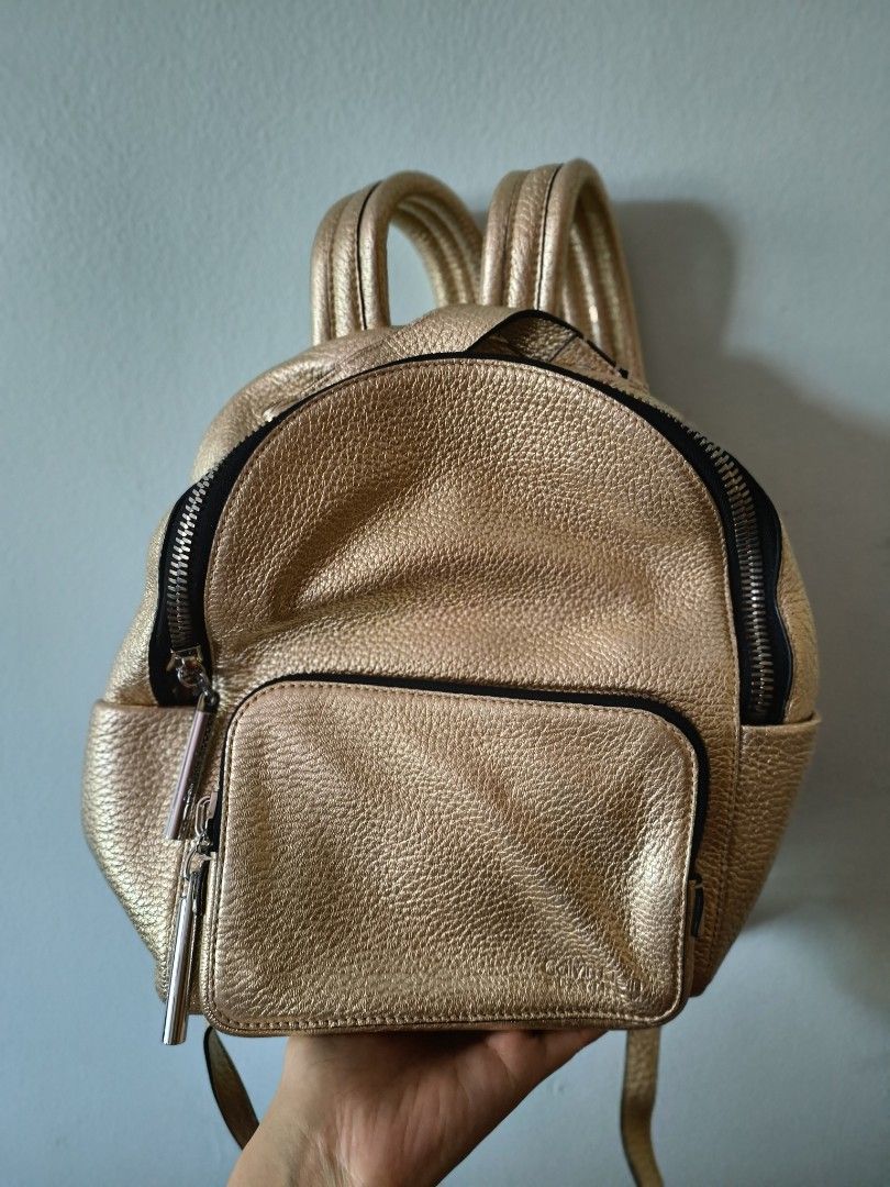 Gold deals backpack purse