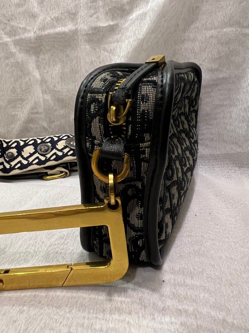 Dior oblique canvas diorquake clutch bag deals