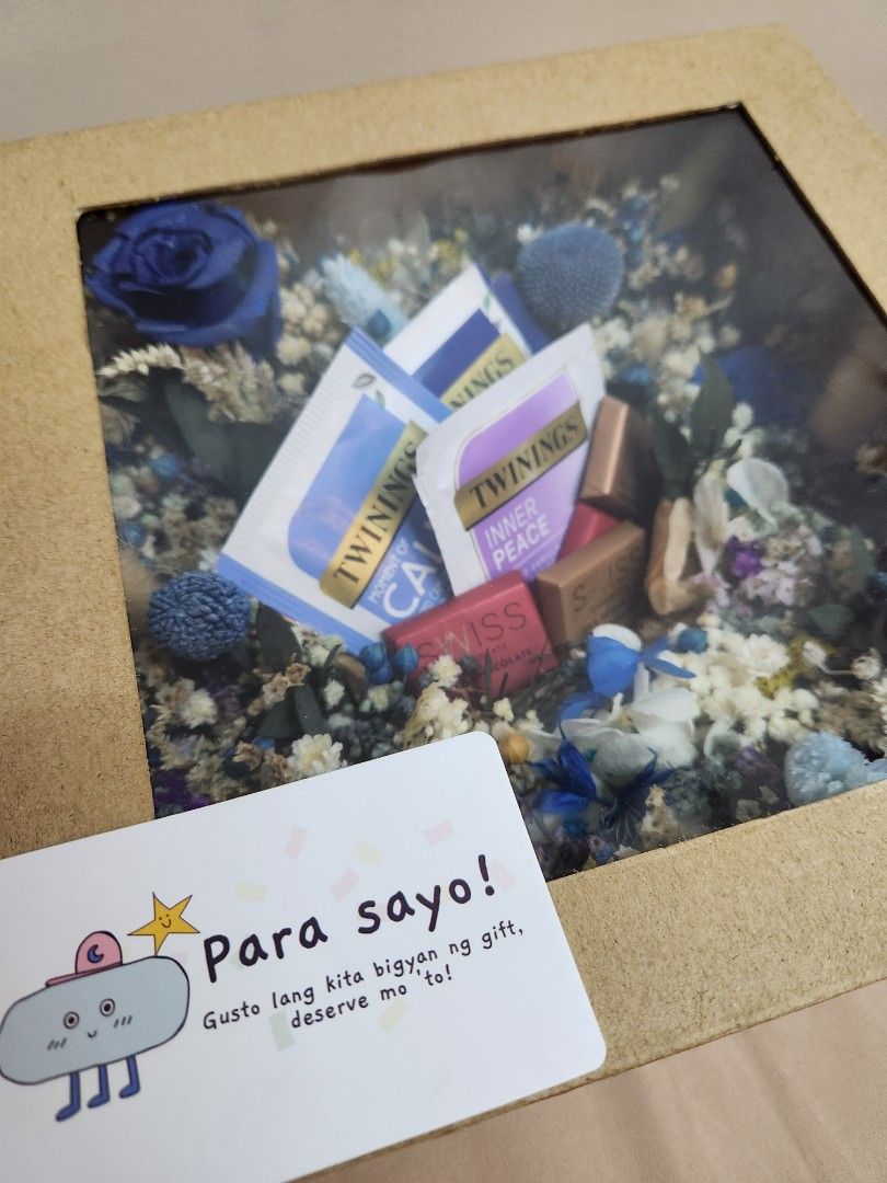 Gift box with window - dried flowers and gift (Category: Flowers & Bouquets) located in Quezon City. Submitted by gcuraming (Listing ID 1248249911, Image 2). Description: Price of dried flower box STARTS at P1200 (size: 9x9 box) Smaller box: 7x7 starts at P1,000 Total price depends on the colors and preferences (gifts like chocolate, teas are not included) Lead time upon payment: 3-5 days.