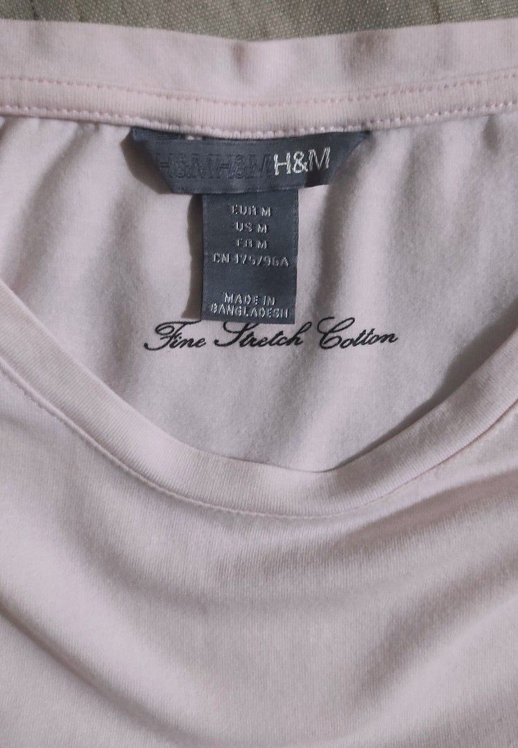 H&M Women's Basic Tee (Category: Shirts) located in Manila. Submitted by the_simple_things (Listing ID 1248270727, Image 2). Description: Authentic H&M Women's Basic Tee Fine Stretch Cotton Color: Baby pink Excellent used condition Looks like new No flaws Imported from Canada Size: Medium.