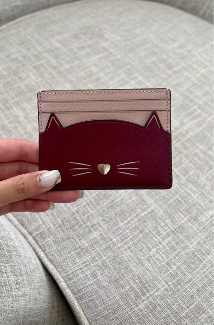 Kate Spade kitty card holder on Carousell