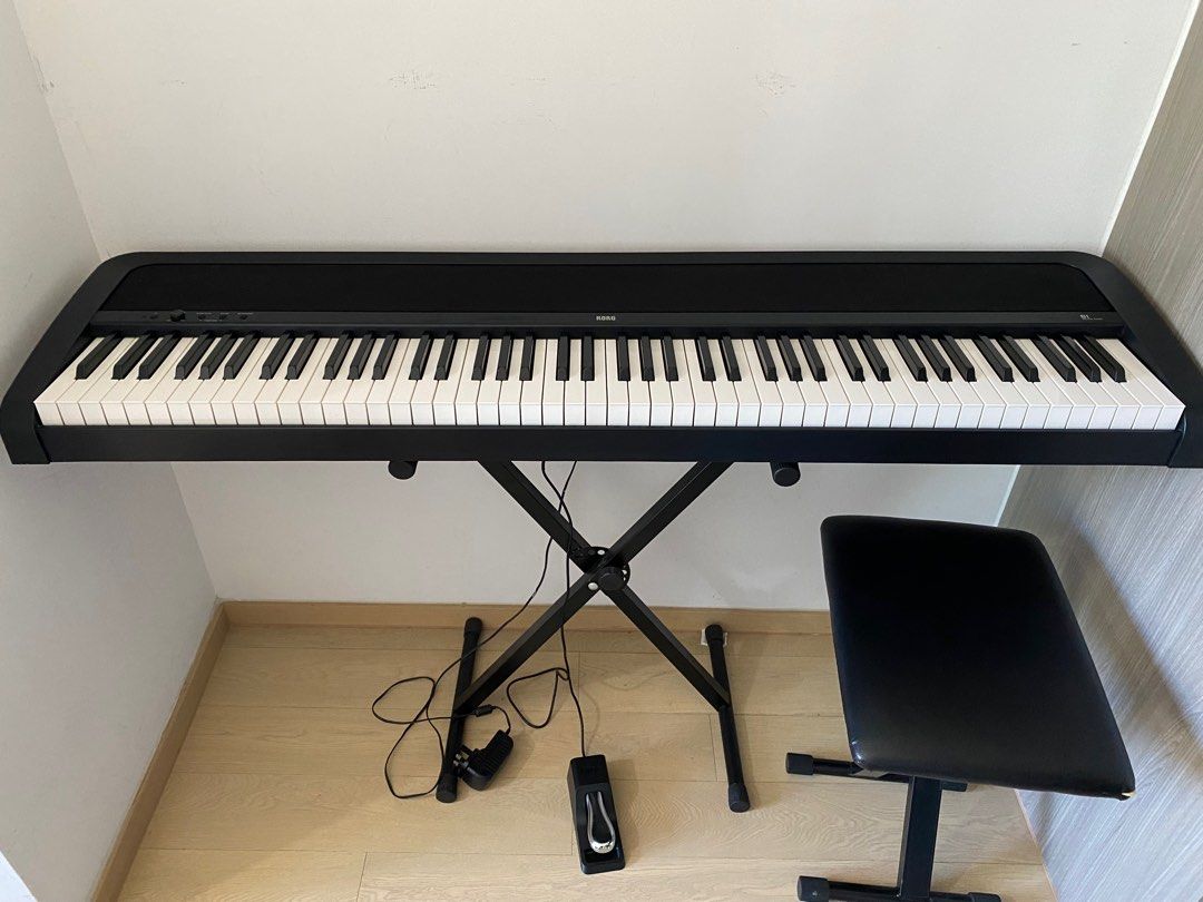 Korg B1. Barely used keyboard piano with weighted keys. Peddle and