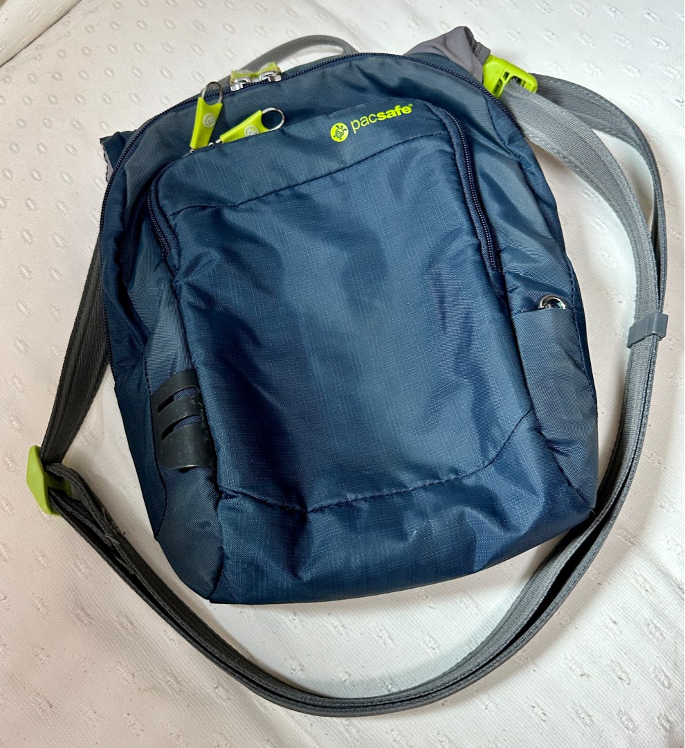 Pacsafe sling bag with security feature, Men's Fashion, Bags, Sling