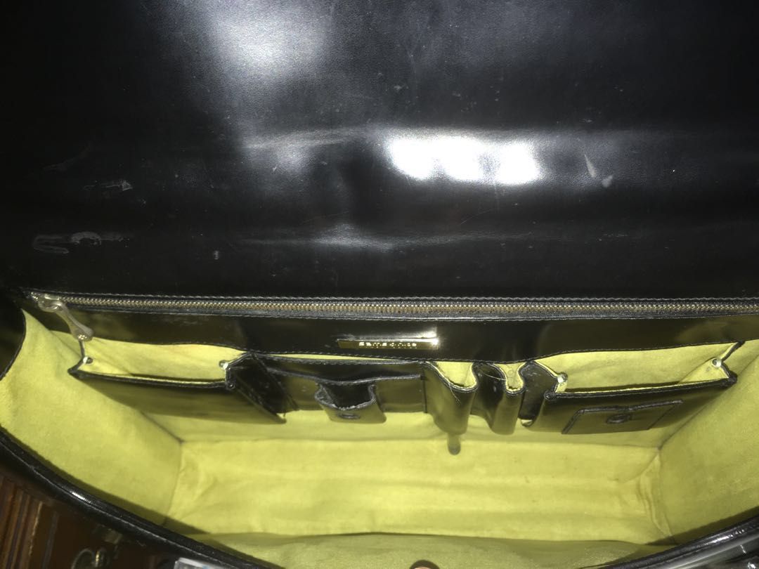 Samsonite briefcase (Category: Briefcases) located in Makati City. Submitted by unloadealr (Listing ID 1243556412, Image 1). Description: very smooth shiny finish with minimal leather creases, small dents, spot leather and metalware discoloration length 37 cm width 28 cm depth 6-8 cm .