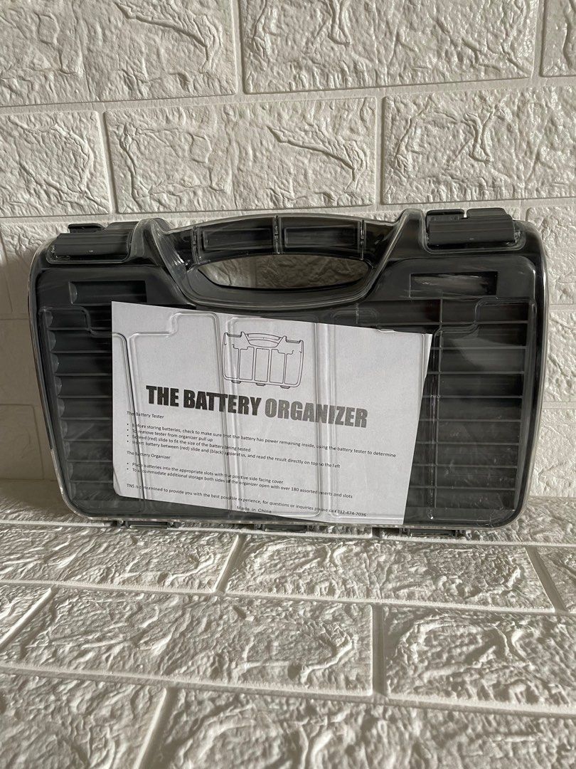 The Battery Organizer Battery Storage Case with Hinged Clear Cover,  Includes a Removable Battery Tester, Holds 180 Batteries Various Sizes Blue.