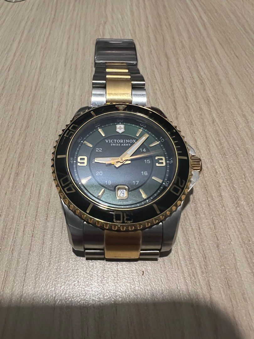 Gold victorinox hotsell watch