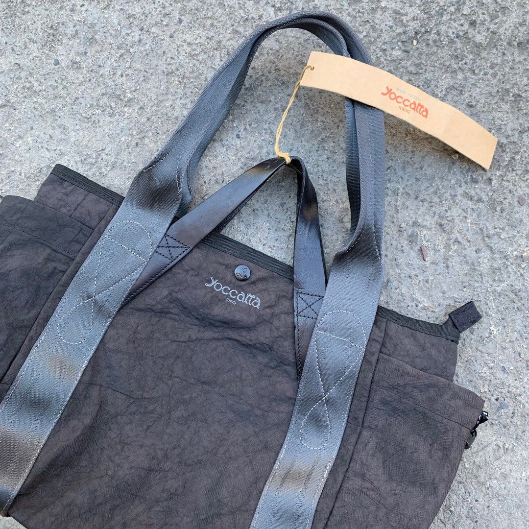 Yoccatta Tokyo Two way Bag (Category: Shoulder Bags) located in Manila. Submitted by fromtheflea (Listing ID 1248222224, Image 2). Description: Yoccatta Tokyo Two Way Bag Can be tote bag and hand bag excellent condition; made from recycled airbags from car manufacturers brand new with tag; no issues can fit tablets and such Php 1500 only.