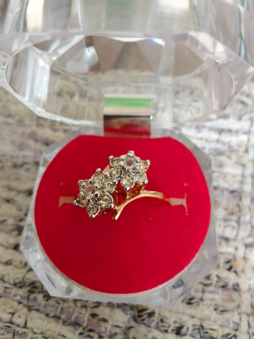 18k GE 2tone,double rositas ring (Category: Rings) located in Cavite. Submitted by dreamsky21 (Listing ID 1248343339, Image 2). Description: 18k GE Gold Electro Plated Markings Ladies Ring 2 tone gold and white color size 7 materials and stones Unknown ring box included bought in Japan.