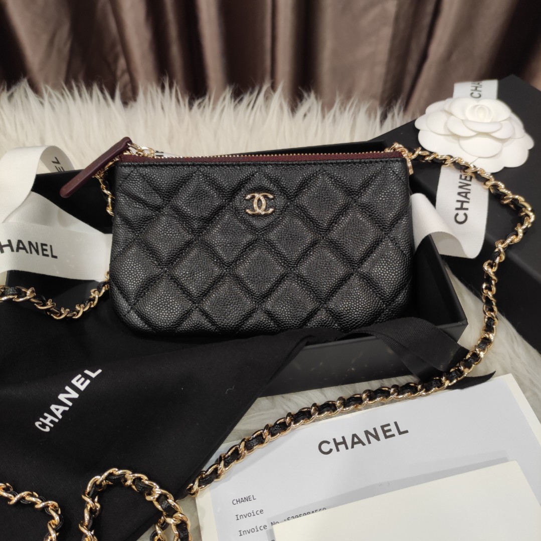 Pre-loved Chanel Mini O-case Pouch – My Bag Boutique