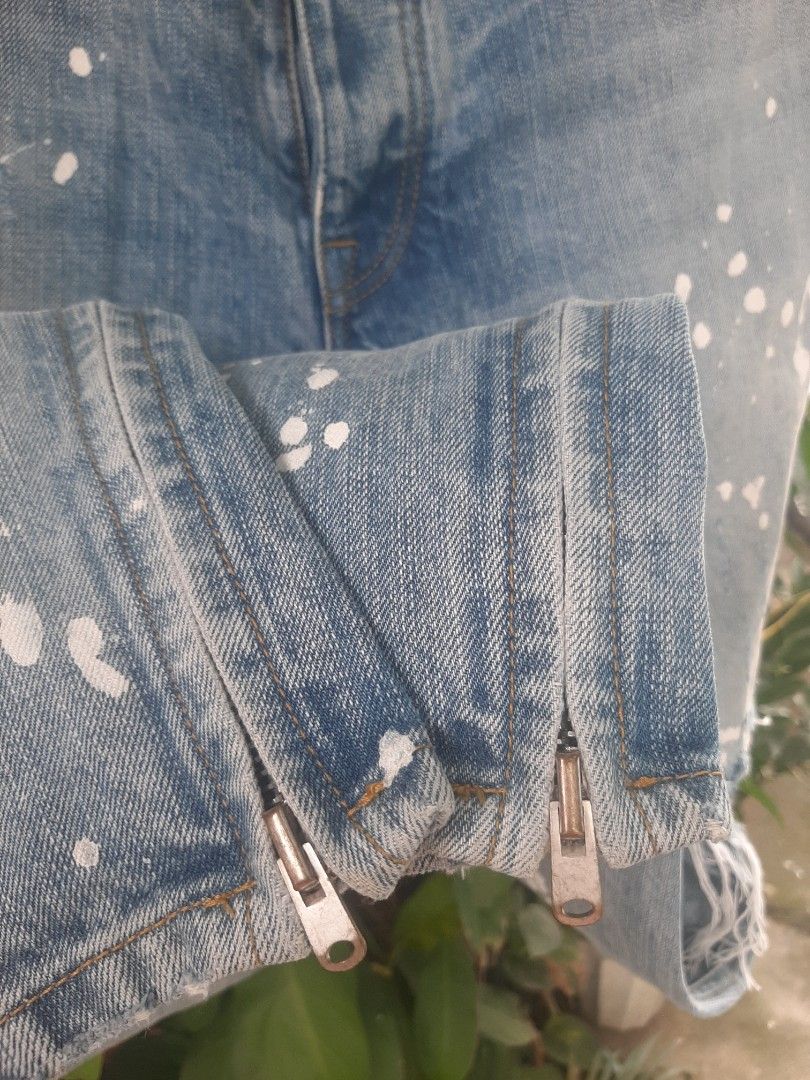 Fear of god painted jeans on sale