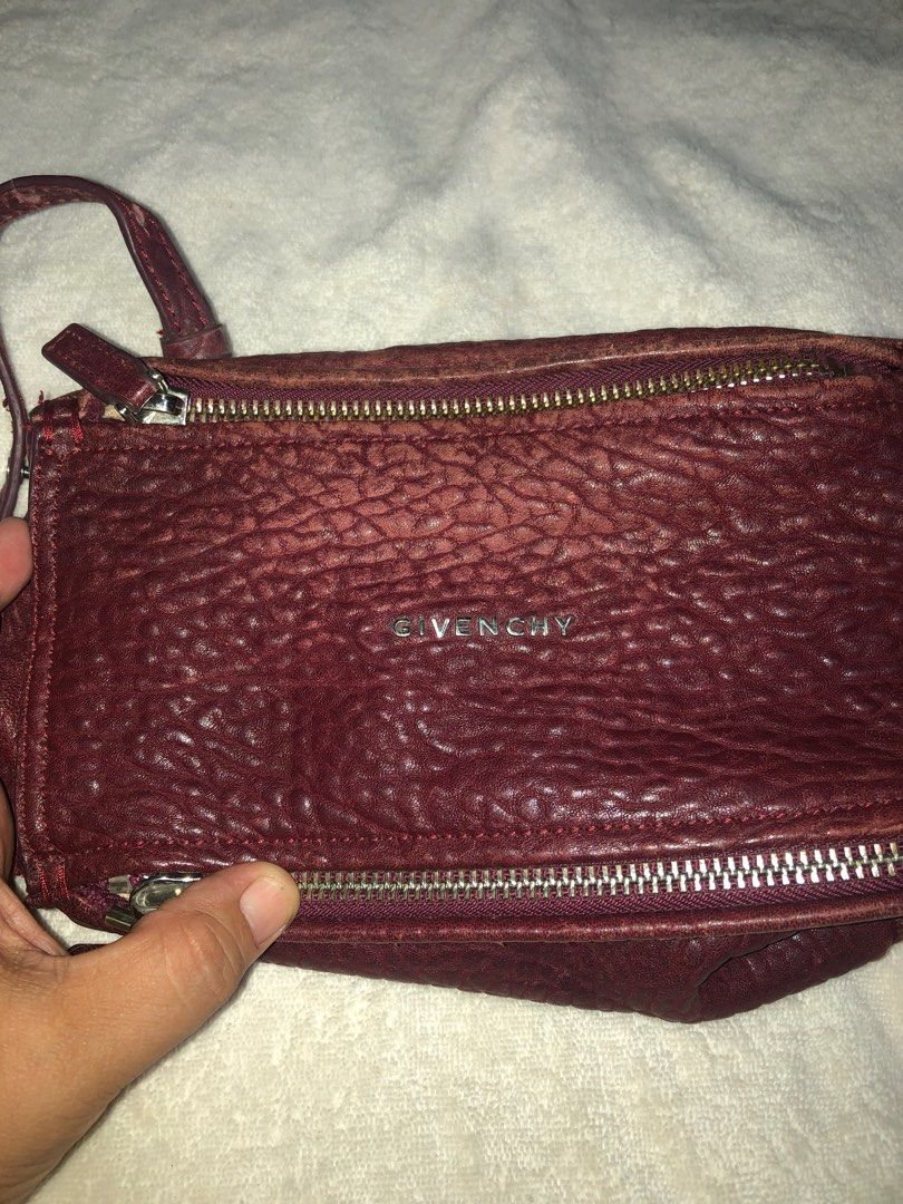 Givenchy mini pandora (Category: Luxury Bags & Wallets) located in Caloocan City. Submitted by bingsky312 (Listing ID 1248357316, Image 2). Description: Visible signs of use Putol dulo ng sling (please see pic) May tahi sa sling slot (please see pic) May crack sa sling strap pero ndi mapipigtas Wine red color .