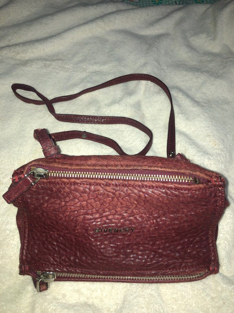 Givenchy mini pandora (Category: Luxury Bags & Wallets) located in Caloocan City. Submitted by bingsky312 (Listing ID 1248357316, Image 1). Description: Visible signs of use Putol dulo ng sling (please see pic) May tahi sa sling slot (please see pic) May crack sa sling strap pero ndi mapipigtas Wine red color .
