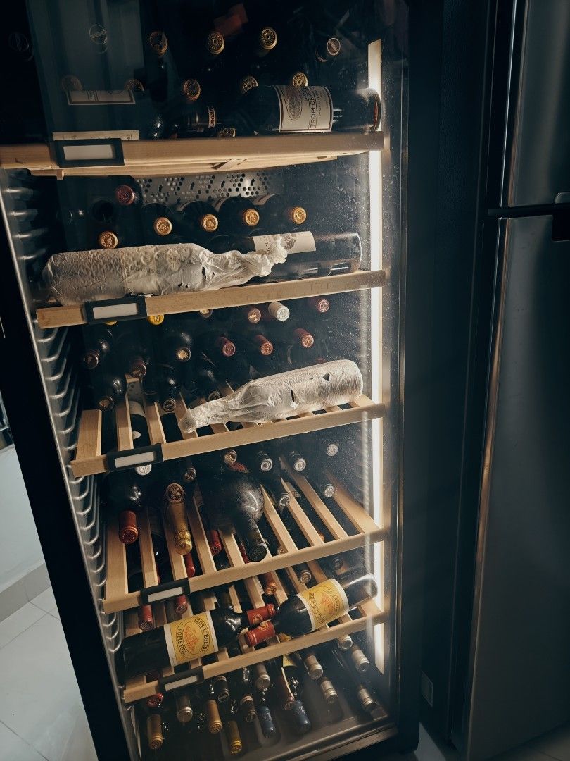 LIEBHERR Wine Fridge and 100 fine red wine bottles, TV & Home