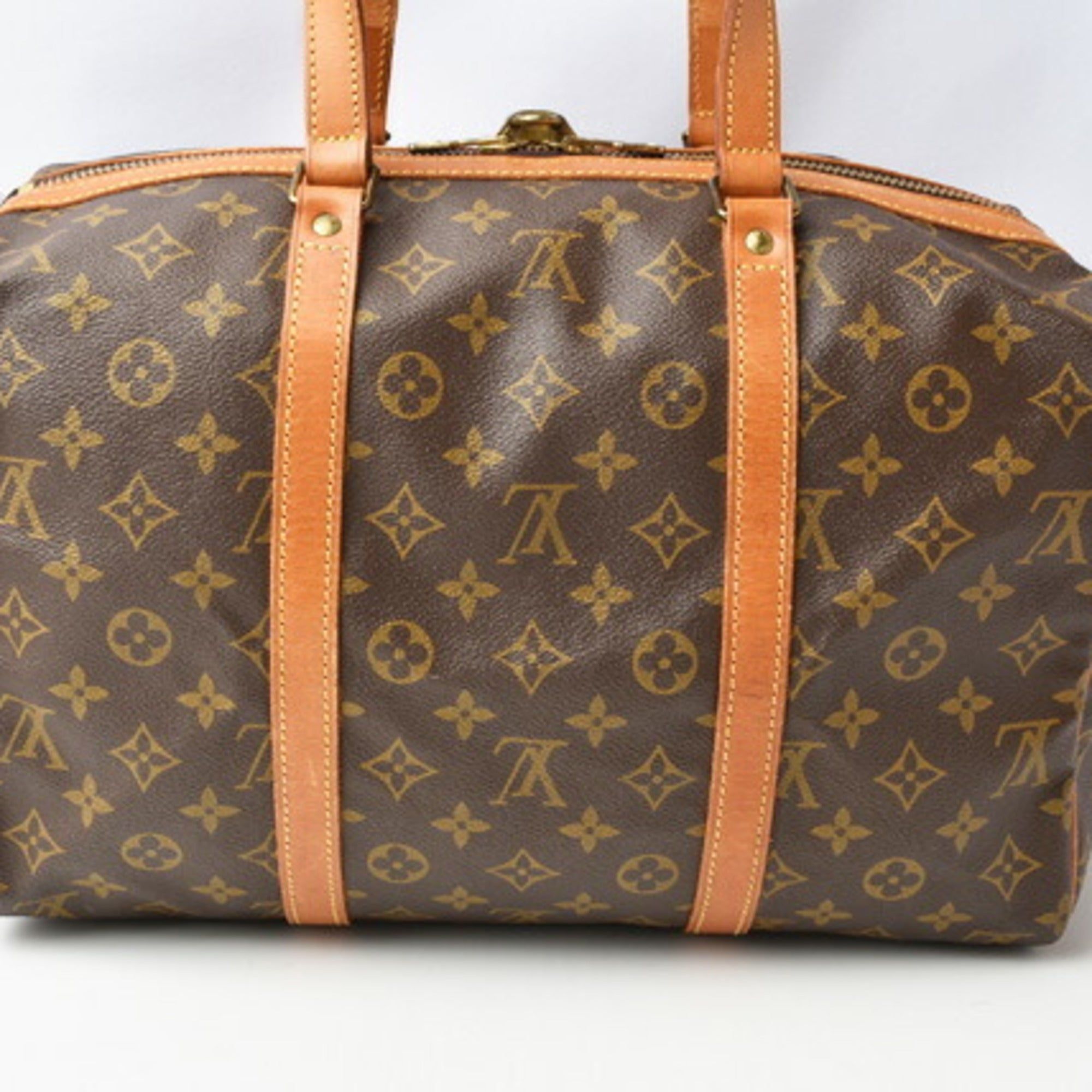 Duffle crossbody bag Louis Vuitton Brown in Cotton - 24142836