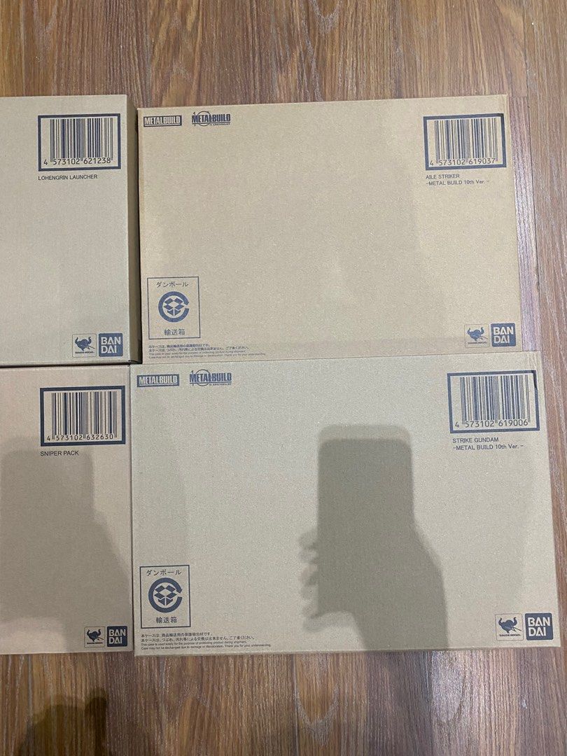 Metal Build Strike Set (10th Anniversary) (Category: Gundam & Model Kits) located in Taguig. Submitted by krld2 (Listing ID 1248427847, Image 3). Description: All new (in brown box) and unopened items - Metal Build Strike Gundam (10th Ver.) - Metal Build Aile Striker (10th Ver.) - Metal Build Caletvwlch Option Set (2x) - Metal Build Sniper Pack - Metal Build Lohengrin Launcher - Metal Build Sword Striker Pack Selling as set only. Location: Bustos