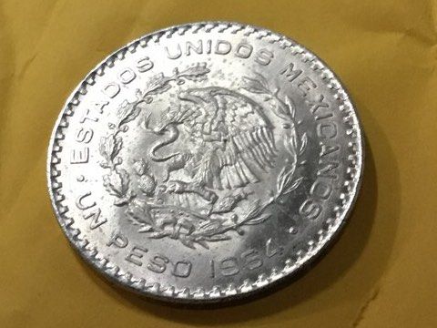 Mexican UN PESO Silver MO coins (Category: Currency) located in Del Monte. Submitted by bernapi63 (Listing ID 1248350397, Image 2). Description: UN PESO Mexican Silver Coins Gen.Jose Morales Varied years 1954 -1966 36 mm diameter With letter edge lettering “libertad y indepencia Individual flip plastic only Have 10 pcs on hand.