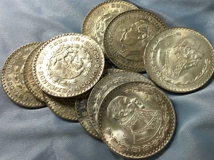Mexican UN PESO Silver MO coins (Category: Currency) located in Del Monte. Submitted by bernapi63 (Listing ID 1248350397, Image 3). Description: UN PESO Mexican Silver Coins Gen.Jose Morales Varied years 1954 -1966 36 mm diameter With letter edge lettering “libertad y indepencia Individual flip plastic only Have 10 pcs on hand.