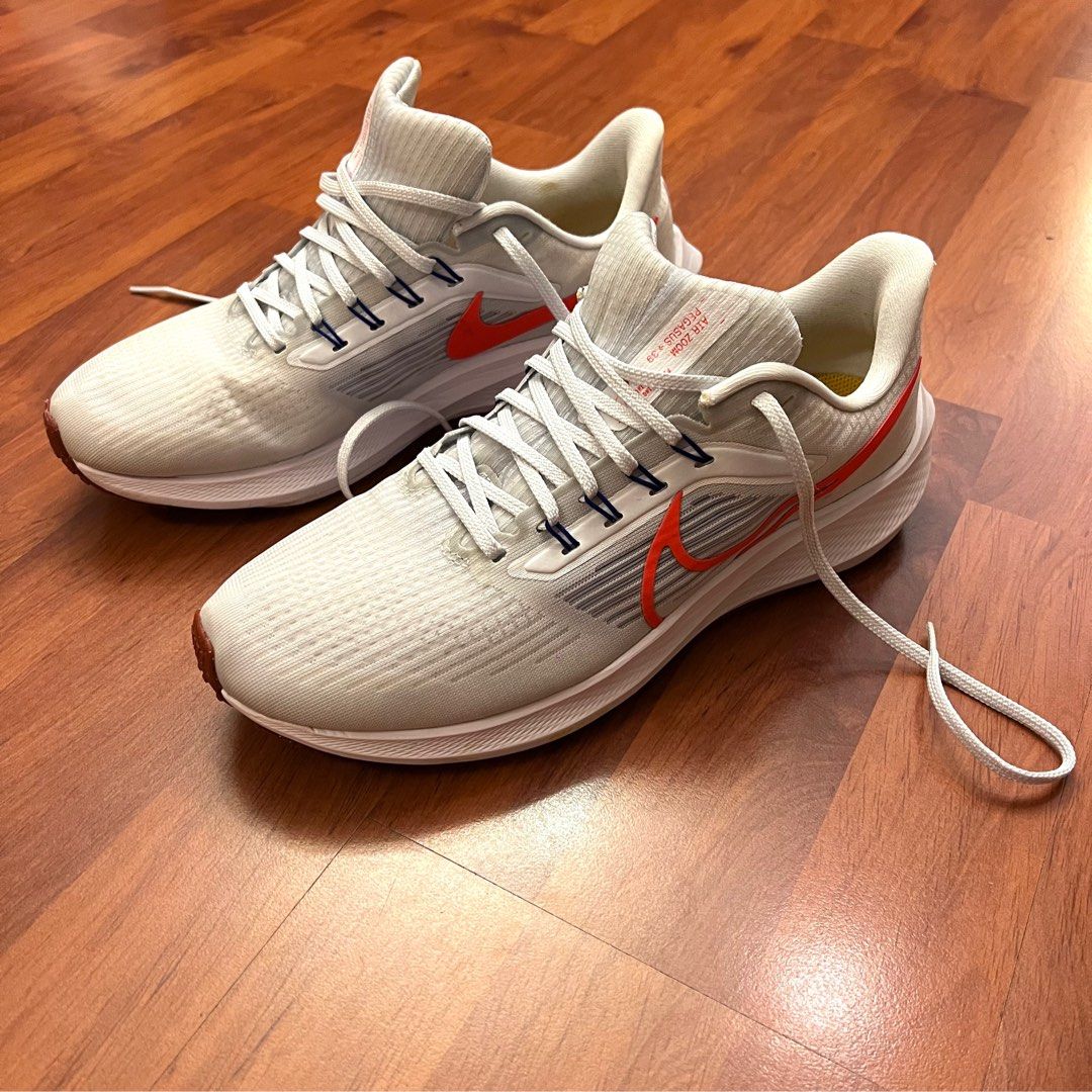 Red nike sales running trainers