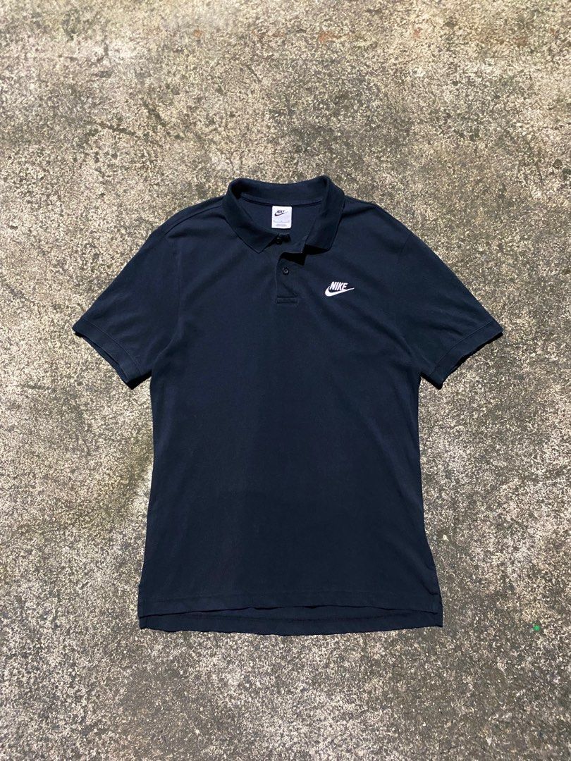 NIKE POLO (Category: Tshirts & Polo Shirts ) located in Dagupan City. Submitted by ctrl.thrift (Listing ID 1248461957, Image 1). Description: Nike Dark Blue Polo Size: Medium to Large Width: 19 Length: 28.5-30 Condition: excellent Color rate: 9./8/10 Issue: none.