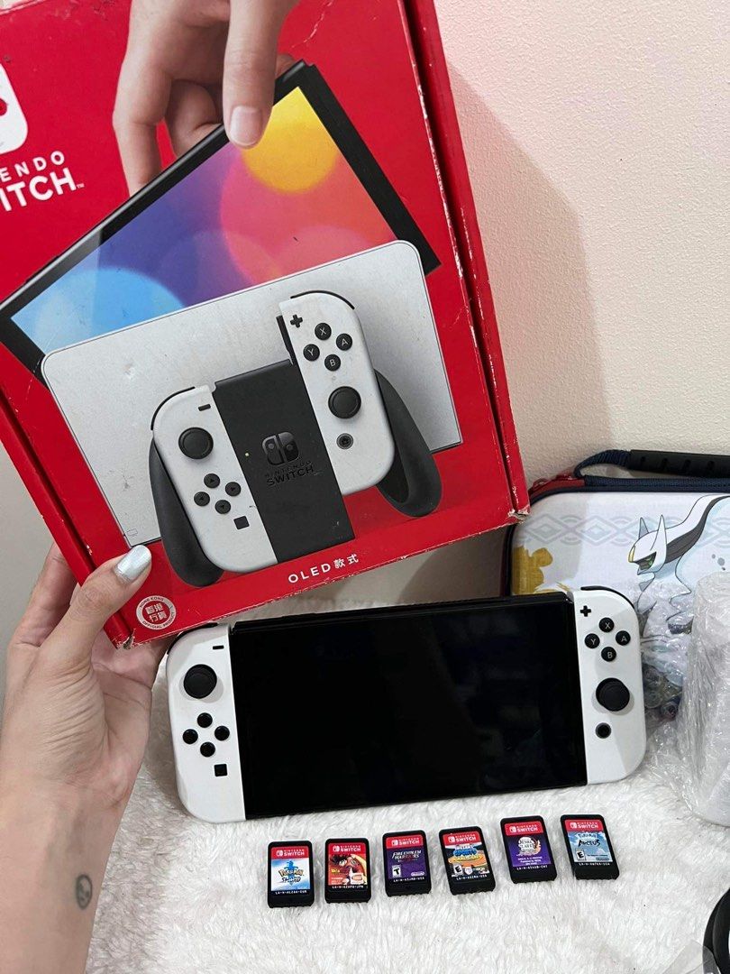 NINTENDO SWITCH OLED (Category: Nintendo) located in Paranaque City. Submitted by macy_s (Listing ID 1248322589, Image 2). Description: NINTENDO SWITCH OLED- 25,000 (negotiable) INCLUSIONS: -Box -HDMI -Charger -Docking Station -Controllers -Straps -Grip -6 Games >Instant sport summer games >Dragon ball Z >Fire emblem warriors three hopes >Demon slayer the hinokami chronicles >Pokemon legends arceus >Pokemon sword NO ISSUES, NO DENTS OR SCRATCHES.