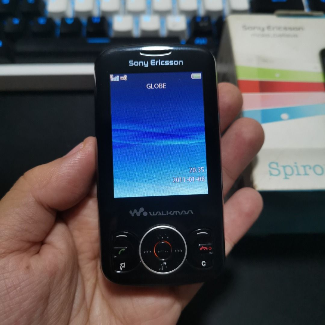 SONY Ericsson Spiro W100i | Item Code: 46517 (Category: Early Generation Mobile Phones) located in Caloocan City. Submitted by christian.montalban (Listing ID 1248458960, Image 1). Description: SONY Ericsson Spiro W100i | Item Code: 46517 COLLECTIBLE PHONE Price: P3,599.00 Color: Stealth Black 5MB ROM 2.2" TFT LCD Display 950 mAh Li-Po Removable Battery OS: Early Generation Phone Package: Unit, Battery, Manual, and Box Only.