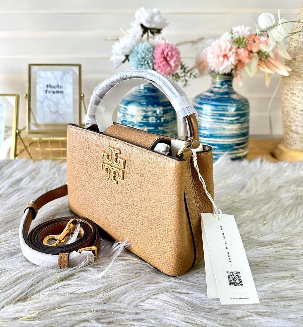 Tory Burch Mini Britten (Category: Luxury Bags & Wallets) located in Mandaluyong City. Submitted by shop_0n_the_spot (Listing ID 1248369782, Image 3). Description: 💯% GUARANTEED ORIGINAL & BRAND NEW. 🚨 Available / OnHand PH 🚨 Cash/Installment INCLUSIONS: ✅ Tag ✅ Care card ✅ Polyplastic ✅ Paper bag (if available) We shall not be held responsible/liable for any damage/delay due to courier negligence. All joy miners will no longer be entertained 