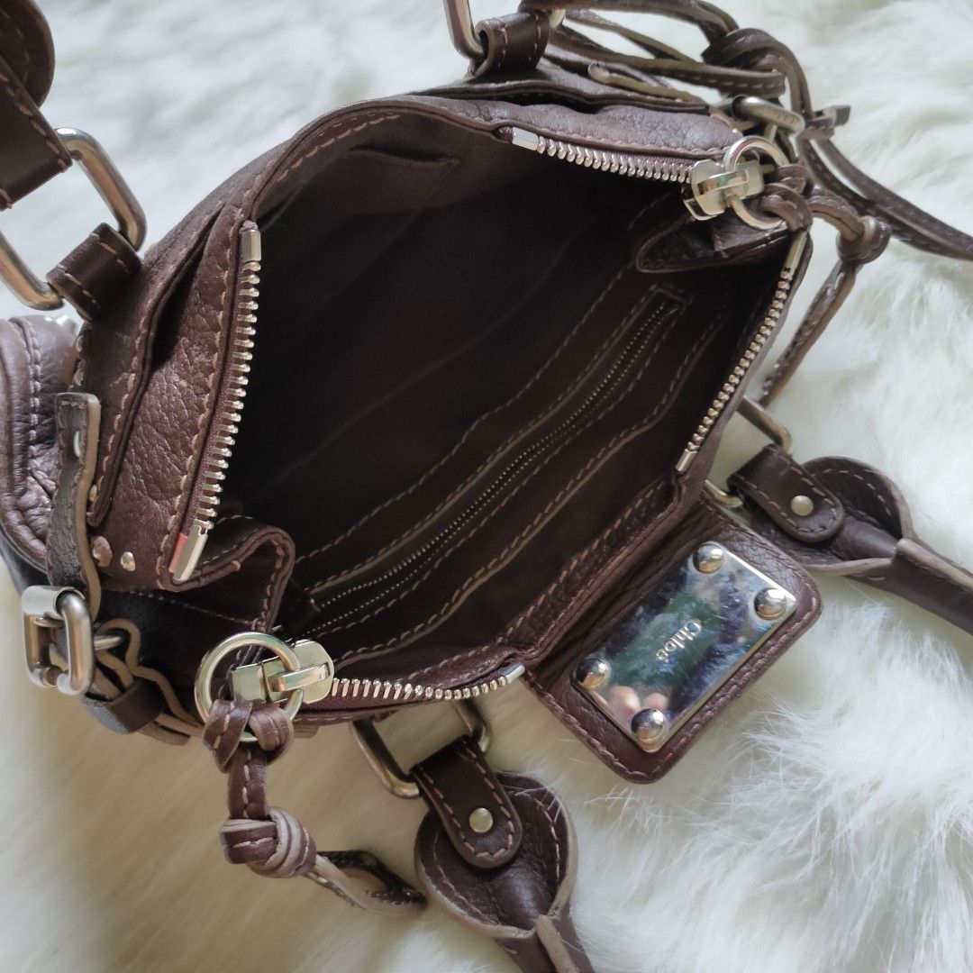 CHLOÉ | Mini Paddington Handbag (Category: Luxury Bags & Wallets) located in Cebu City. Submitted by denimholic (Listing ID 1248602792, Image 2). Description: 💼Authentic Preloved Chloe Bag ▫️STYLE : Mini Handbag, Genuine Leather, Silver hardware ▫️SIZE : Small (W 10in / H 6.5in) ▫️RANK AB **missing padlock.