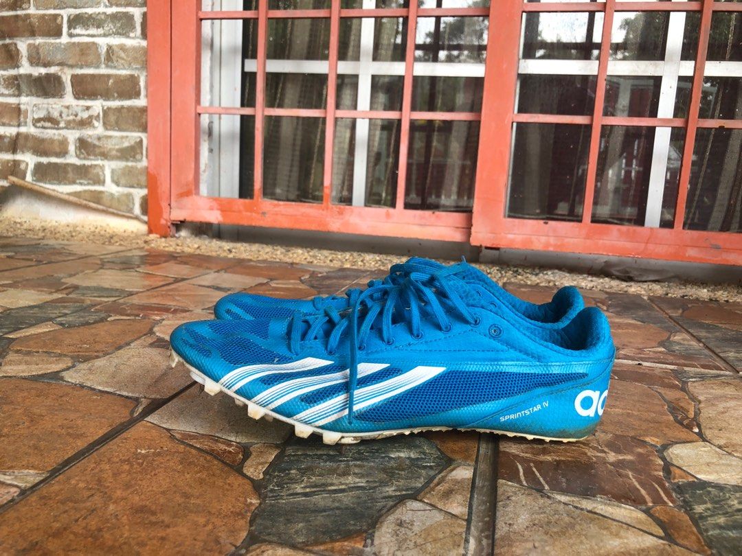 Kasut shop spike adidas