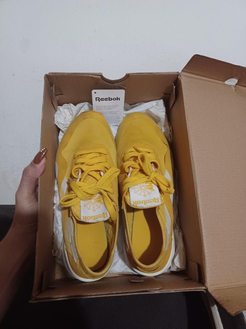 Reebok mustard yellow Women s Fashion Footwear Sneakers on