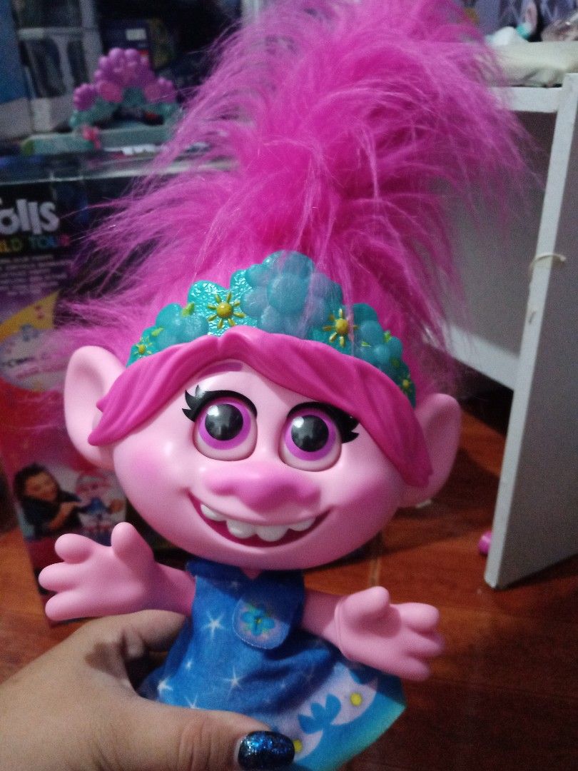 Trolls poppy 16 inch dancing doll (Category: Kids Toys) located in Quezon City. Submitted by saffiyanicole23 (Listing ID 1248628628, Image 2). Description: Mall price 4k Missing comb Almost new even it's box..