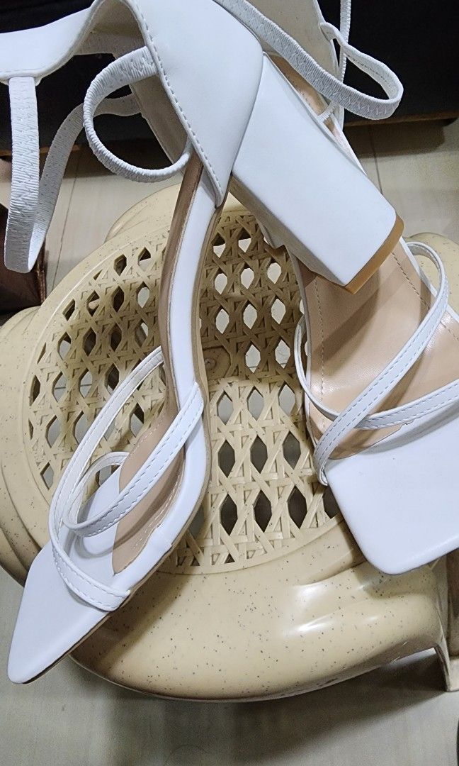 White heels (Category: Heels) located in Mandaluyong City. Submitted by krishasy (Listing ID 1248565722, Image 2). Description: BRAND NEW NO BOX SIZE 43.
