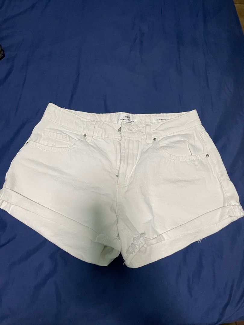 White ripped bermuda shorts on sale