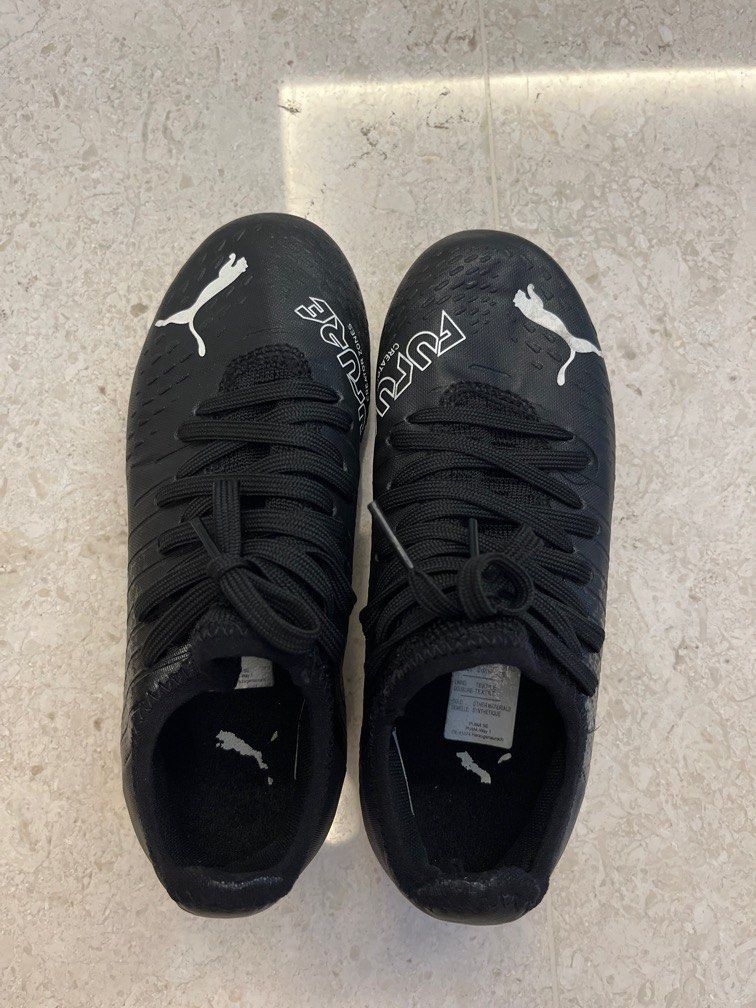 Puma kids cheap soccer shoes