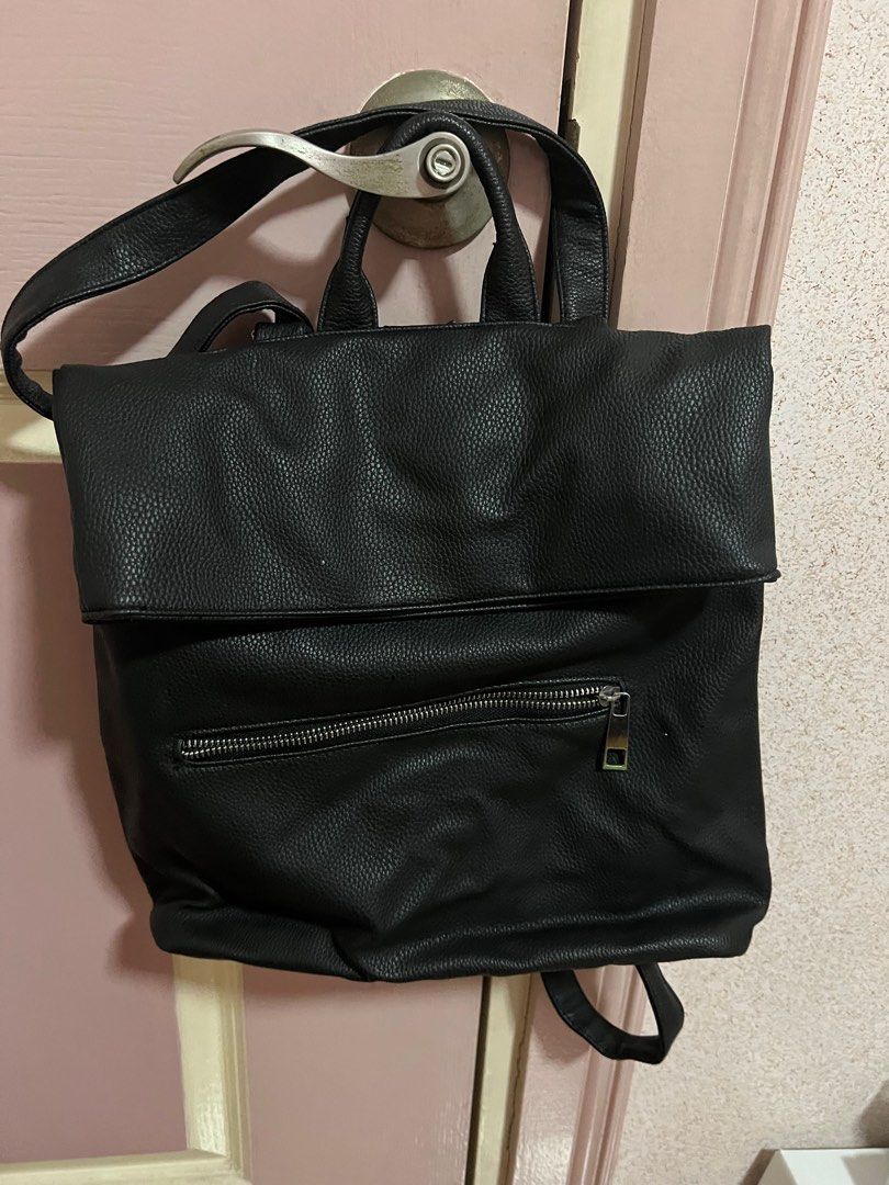 black backpack (Category: Backpacks) located in Quezon City. Submitted by second___life (Listing ID 1248854986, Image 1). Description: black backpack, bought from a random store in korea with adjustable straps could also be a shoulder bag but the bottom part of the bag will be folded just used a couple of times so it’s in pretty good condition! rfs: doesnt match my style anymore .