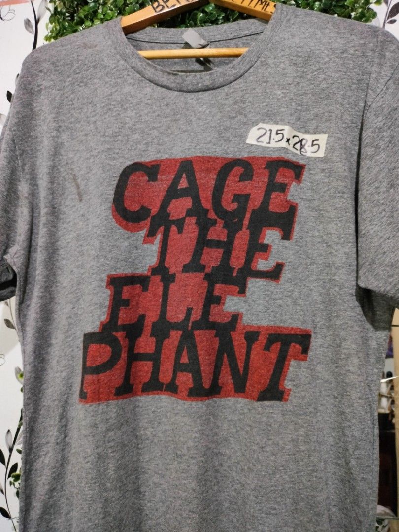 Cage The Elephant (Category: Tshirts & Polo Shirts ) located in Calamba. Submitted by sinauna. (Listing ID 1248831965, Image 2). Description: WTS: Cage The Elephant Condition/Issues: needs wash (Note: Item's not faded. Color may vary due to lighting) Dimension: 21.5x28.5 Size on tag: Large Price: Mine - 399 Plus shipping fee! Free shipping if you purchase more than 3 items. Thank you! Keep safe! 🫂 It might not be available to other shops, cop it
