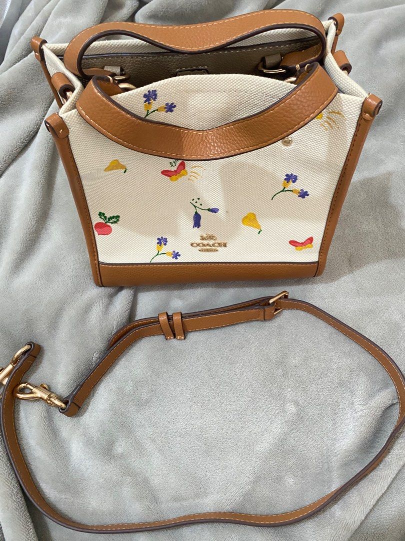 Coach Dempsey Tote Bag (Category: Luxury Bags & Wallets) located in Guimba. Submitted by roquefellas (Listing ID 1248782186, Image 3). Description: High quality Excellent condition (used once) No issue Clean interior and body Free dustbag.