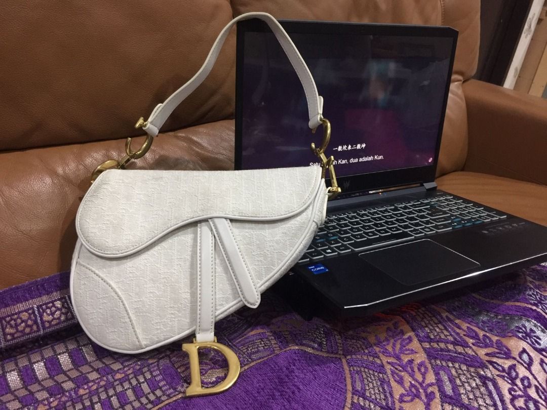 Dior oblique saddle bag white deals