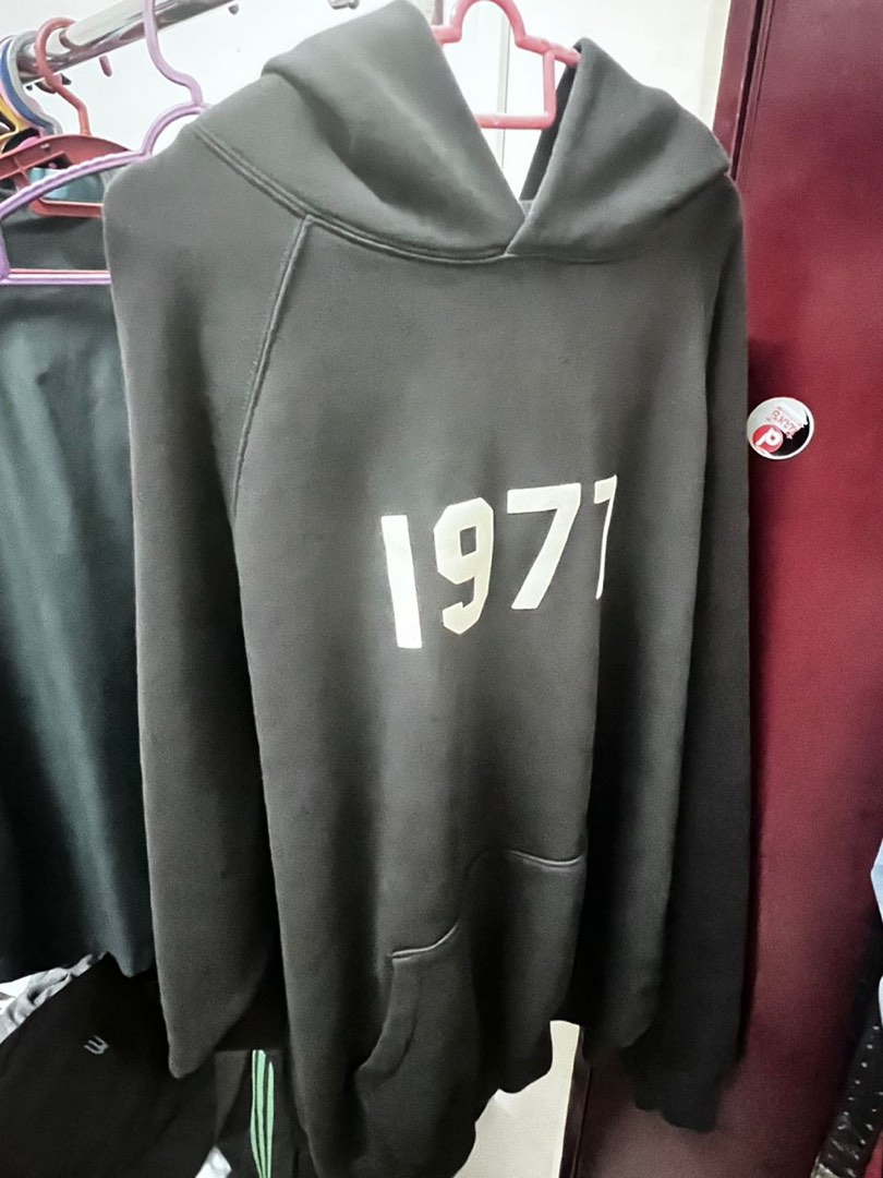 Essential hoodie 1977, Men's Fashion, Tops & Sets, Hoodies on Carousell