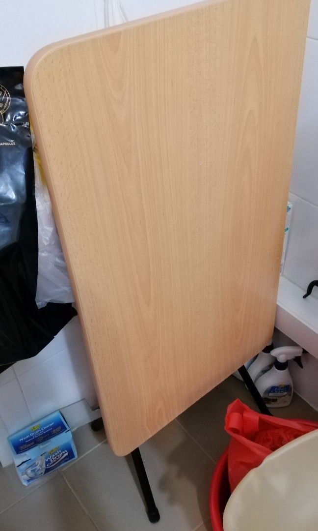 Foldable table (Category: Tables & Sets) located in Singapore. Submitted by bubblicious_115 (Listing ID 1248807507, Image 1). Description: Size is 75cm by 45cm. Edges are rough, as it has been around for long time. If you need delivery to your place, it will be additional $5(Sengkang, jurong or toa payoh area)..