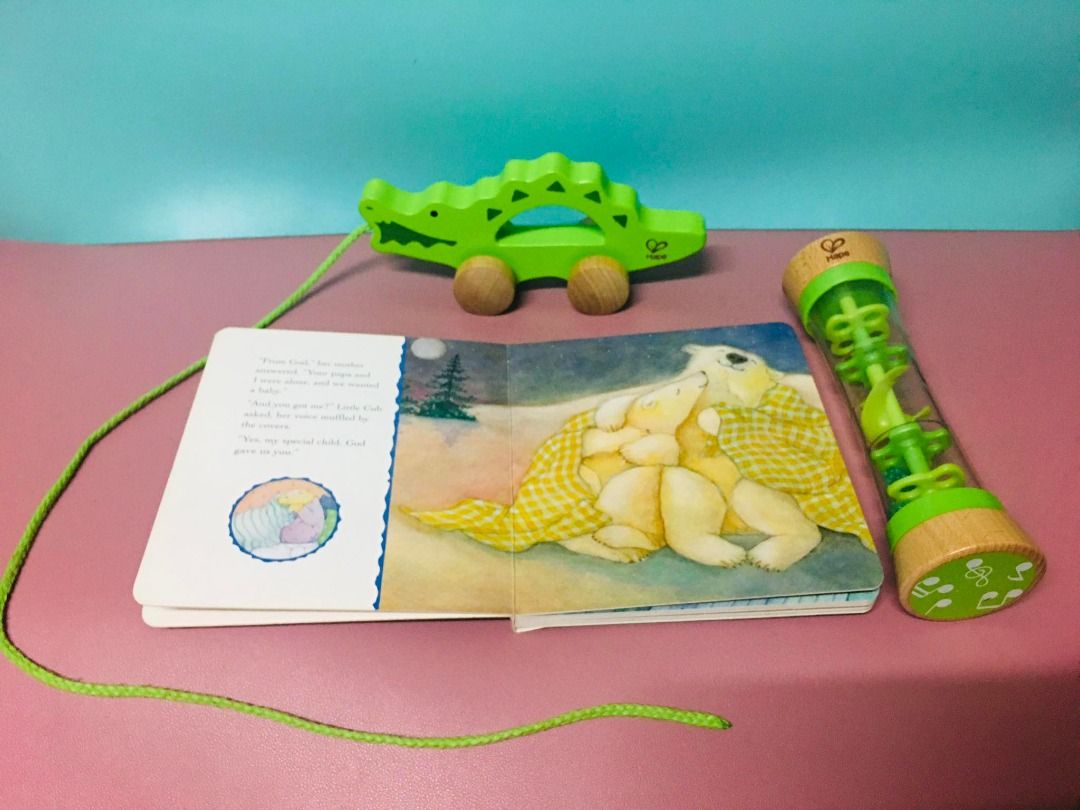 Hape Toys Bundle (Category: Infant Playtime) located in Taguig. Submitted by Bloomscorner1 (Listing ID 1248813062, Image 2). Description: ✅ Bundle contains: 1) Hape beaded raindrops green tube shaker 2) Hape wooden toddler push and pull crocodile toy 3) God Gave Us You board book as freebie.