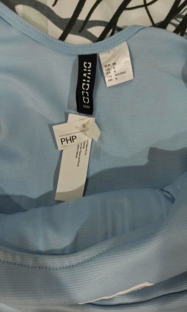 H&M skater dress (Category: Dresses) located in Calamba. Submitted by icymikachu (Listing ID 1248758253, Image 2). Description: Size 6 on tag Measurements when laid flat: Waist: 12.5 in Length: 31.5 in Haven't been worn, just stored in the closet. Still with tag (w/ price removed). With washable stains from dusts in the closet 😅.