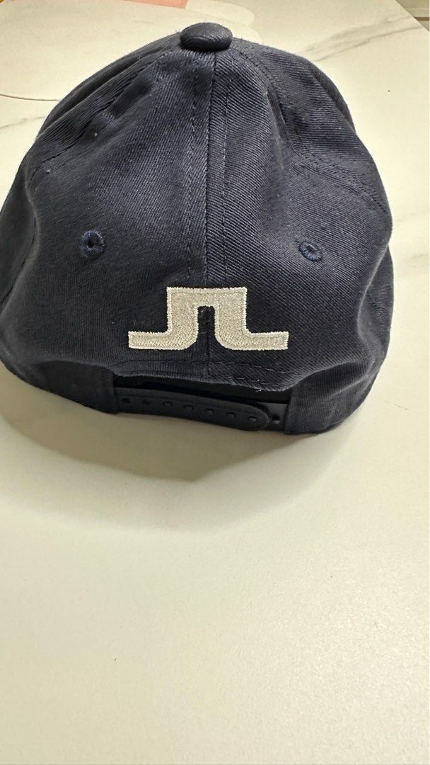 J. Lindeberg Cap Navy (Category: Caps & Hats) located in Makati City. Submitted by davedeesdee (Listing ID 1248836713, Image 2). Description: BGC meetup.