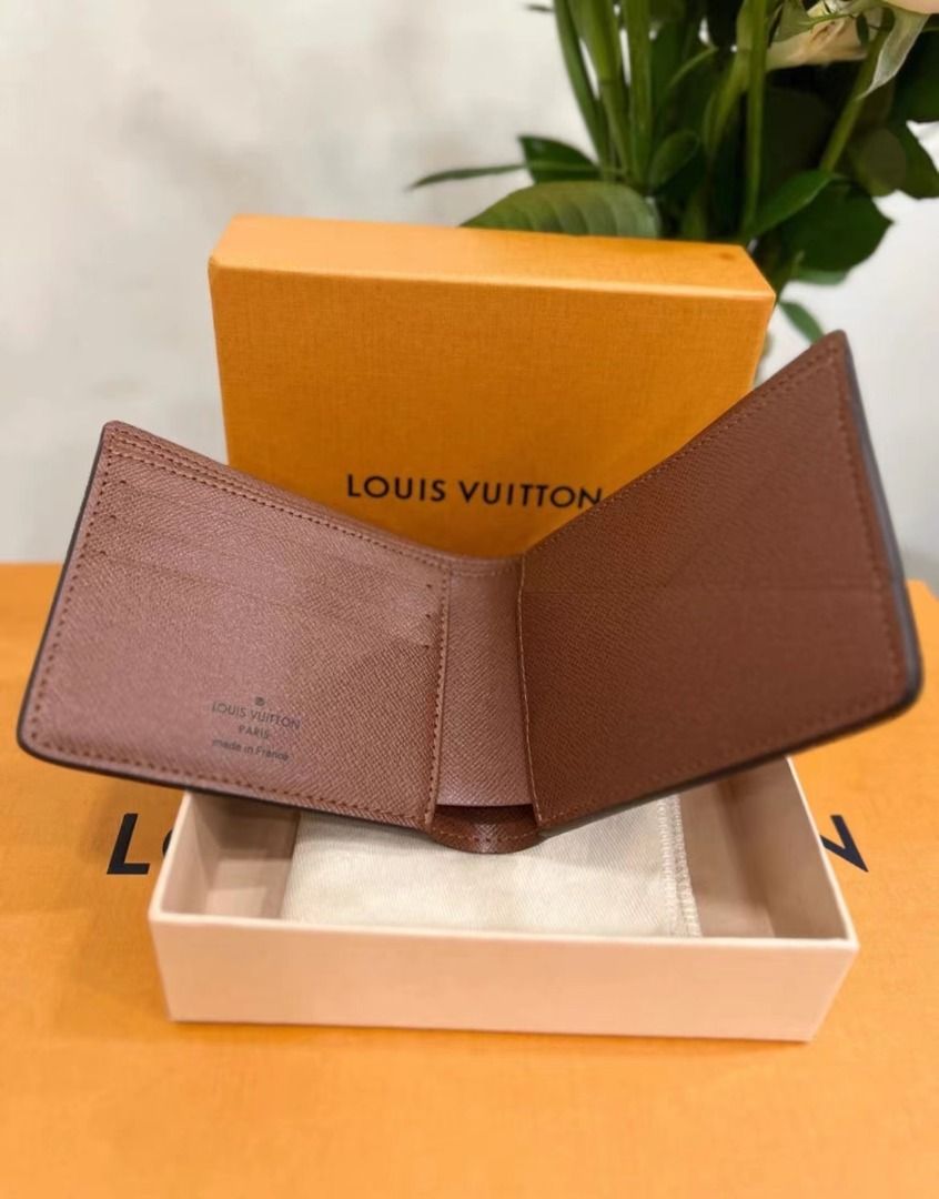 Leather wallet Louis Vuitton Brown in Leather - 28301626