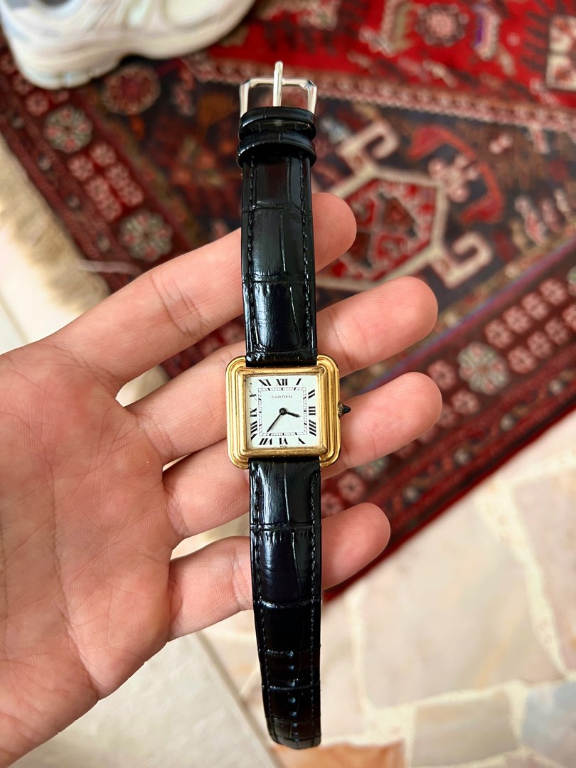 Cartier stepped tank outlet